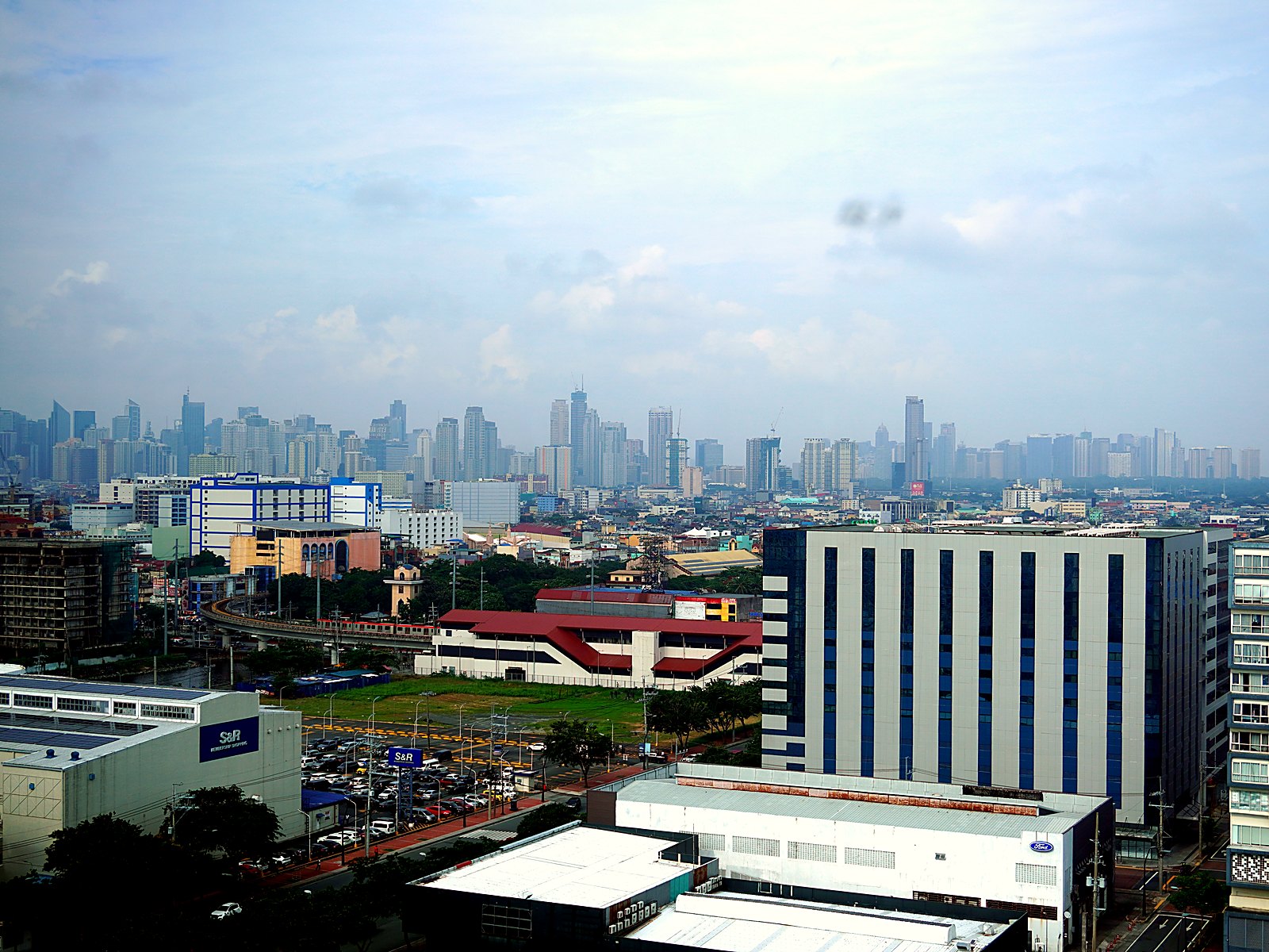 Sinocan Corporate Center — Makati Skyline from the Upper Floors